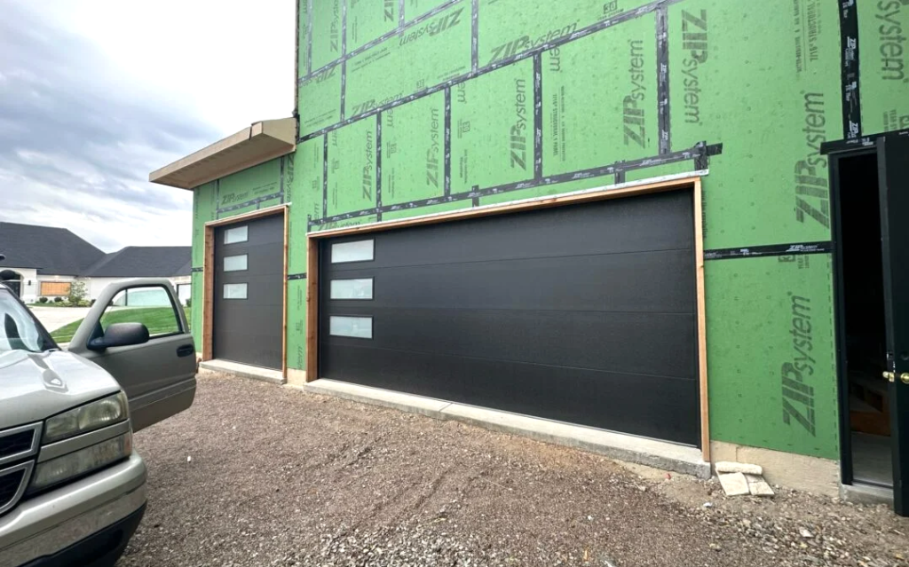 Professional technician performing same day garage door repair service on a residential garage door in Westerville.