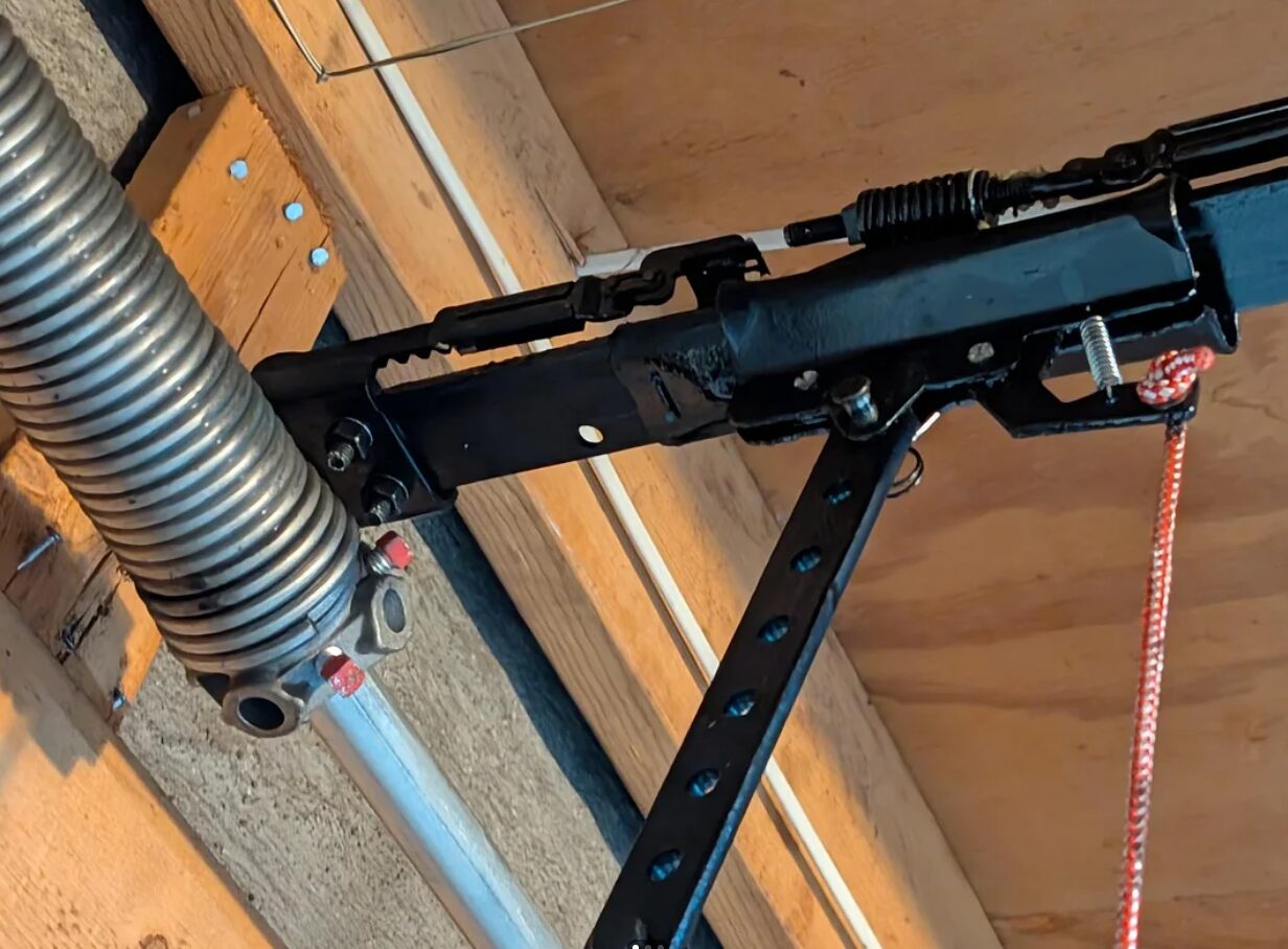 Create alt text for an image to optimize the SEO of the website, Westerville Garage Door Repair: broken spring